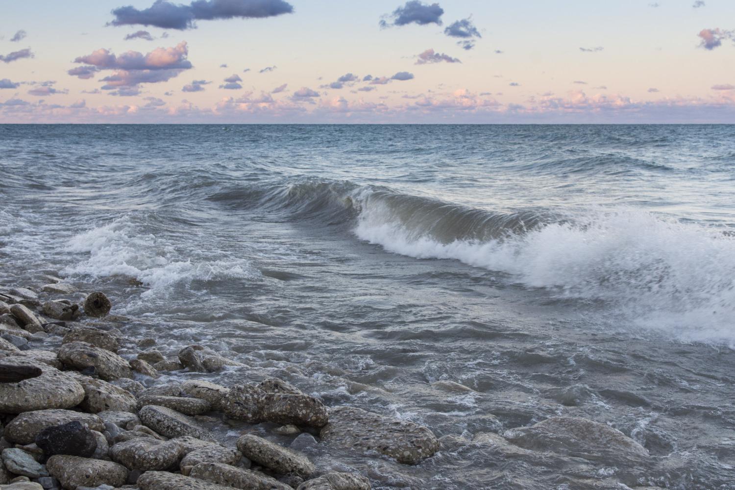 The sun rises over Lake Michigan on the <a href='http://rqxl.psozxd.com'>博彩网址大全</a> campus.